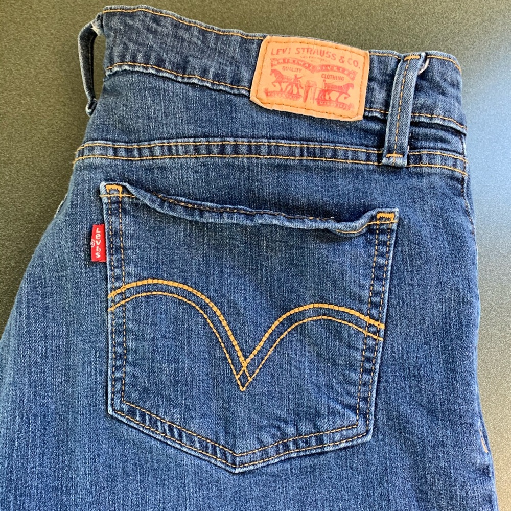 Levi’s 518 size 13 laying flat approximately 33/30